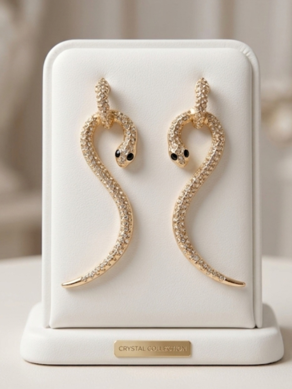 Gold Crystal Snake Drop Earrings With Black Eye Accents